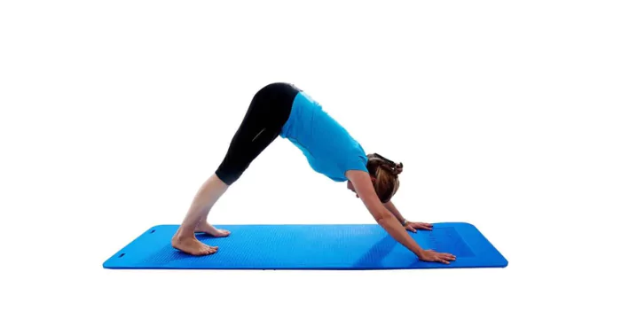 woman doing inverted p on a mat